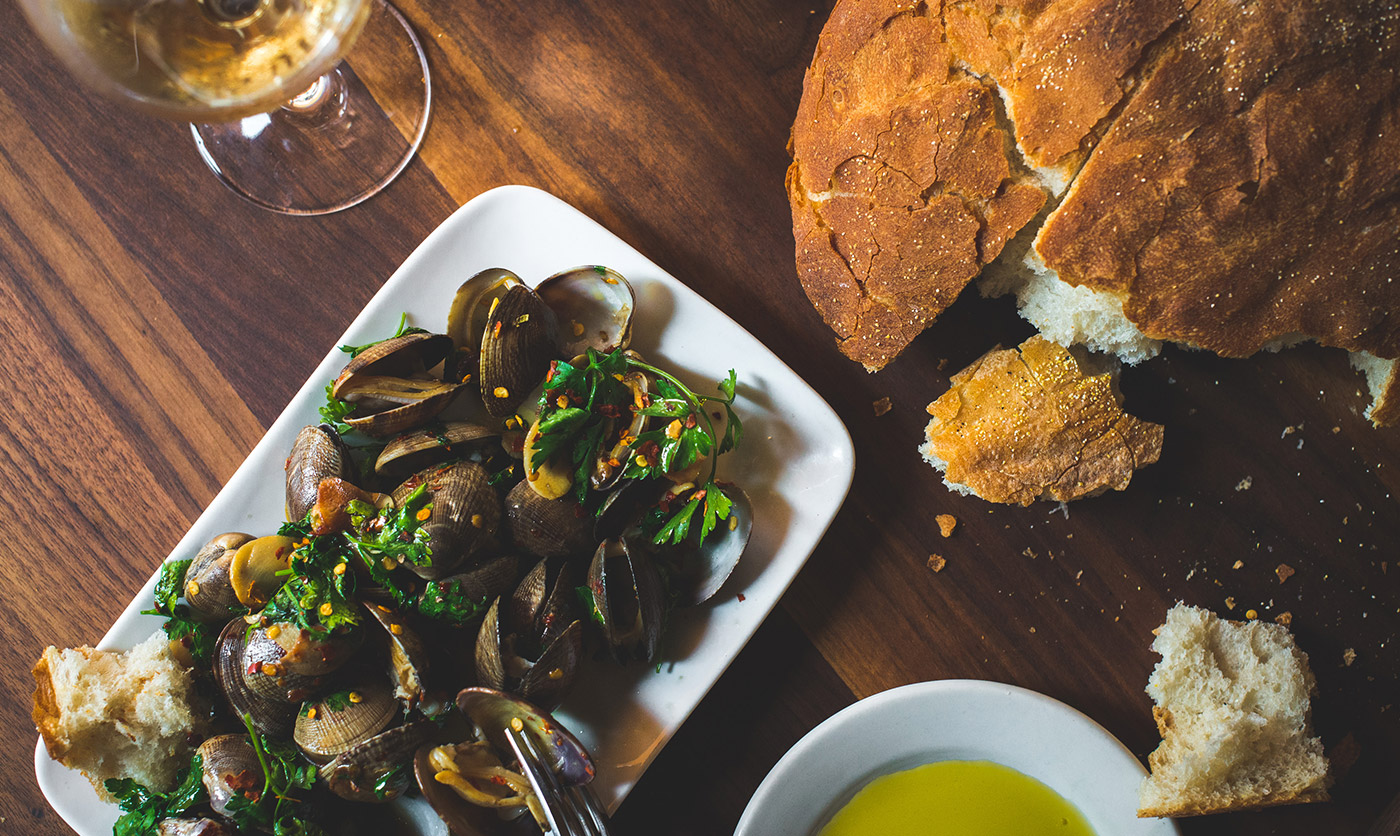 plate of scallops and bread barcelona restaurant